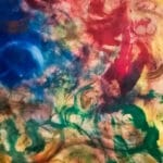Abstract painting where vibrant colors blend and breathe together on canvas